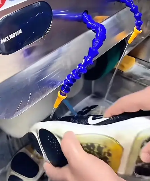 cleaning shoes with machine